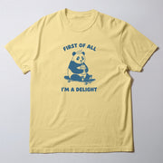 A yellow t-shirt with a graphic design of a panda riding a skateboard and the text 