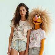A woman and a large, furry character wearing matching 