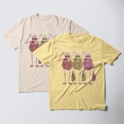 two t-shirts with a graphic design of three cartoon-like figures, each holding a different object, such as a handbag and a suitcase.