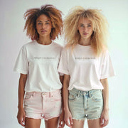 Two young women with curly hair wearing white t-shirts with the text 