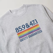 A grey sweatshirt with a graphic design on it.
