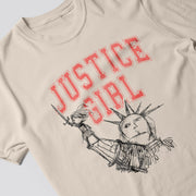 A t-shirt with a graphic design featuring a stylized depiction of the Statue of Liberty and the text 