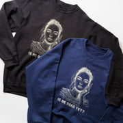 two sweatshirts with a similar design, one black and one blue. The black sweatshirt has a white illustration of a woman's face, while the blue sweatshirt has a similar illustration of a woman's face. Both sweatshirts have the text 