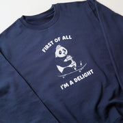 A navy blue sweatshirt with a white graphic design depicting a panda riding a skateboard and the text 