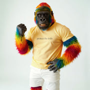 A person wearing a yellow t-shirt with the text 