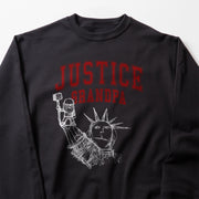 A black sweatshirt with a graphic design featuring a figure holding a flag and the text 
