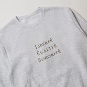 A gray sweatshirt with the text 