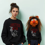 A woman wearing a black sweatshirt with the text 