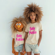 Two individuals wearing t-shirts with the text 