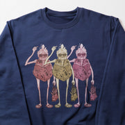 A blue sweatshirt with a graphic design depicting three stylized human figures in a group, each holding a bag and wearing sunglasses.