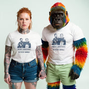 A woman with red hair wearing a white t-shirt with a graphic and text, and a man dressed in a colorful costume with a gorilla-like appearance, standing together.