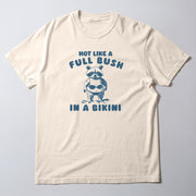 A white t-shirt with a graphic design featuring a raccoon wearing a bikini and the text 