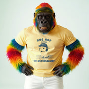 A person wearing a yellow t-shirt with a graphic of a dog and the text 