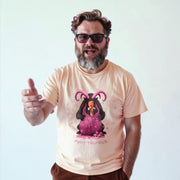A man wearing a t-shirt with a cartoon character and the text 