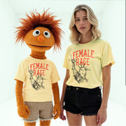 a person wearing a yellow t-shirt with a graphic of the Statue of Liberty and the text 