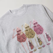 A gray sweatshirt with a graphic design depicting three cartoon-like figures in pink and yellow outfits, each holding a drink and wearing sunglasses.