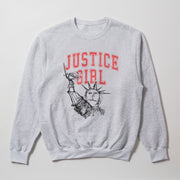 A grey sweatshirt with a graphic design featuring the Statue of Liberty and the text 