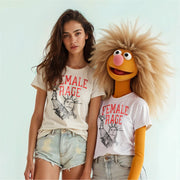 A woman wearing a white t-shirt with a graphic design and a blonde character wearing a white t-shirt with a graphic design.