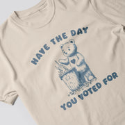 A t-shirt with a graphic design featuring a teddy bear and the text 