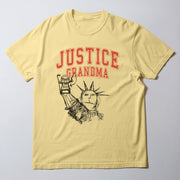 A yellow t-shirt with a graphic design featuring the Statue of Liberty and the text 