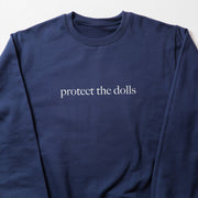 A navy blue long-sleeved shirt with the text 