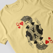 A yellow t-shirt with a graphic design depicting a woman with spiky hair and a black and white illustration of a queen playing cards.