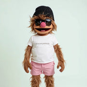 A cartoon character with long hair, wearing a beanie, sunglasses, and a white t-shirt with the text 