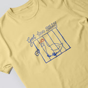 A yellow t-shirt with a graphic design depicting a cartoon duck inside a cage, with the text 