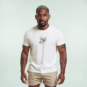 A man wearing a white t-shirt with a graphic of a frog and the word 