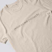 A beige t-shirt with the text 