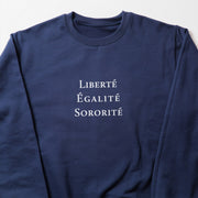 A navy blue long-sleeved shirt with the text 