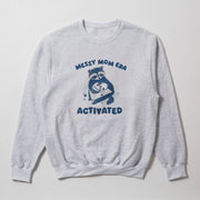 A gray sweatshirt with a graphic design featuring a raccoon holding a sign that says 