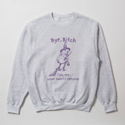 A gray sweatshirt with a purple graphic design depicting a frog wearing a witch's hat and holding a broom, along with the text 