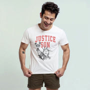 A man wearing a white t-shirt with the text 