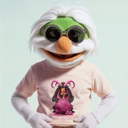 A person wearing a white wig, sunglasses, and a pink t-shirt with a cartoon character on it.
