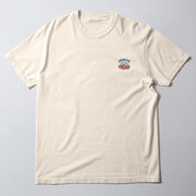 A cream-colored t-shirt with a small graphic design on the front.