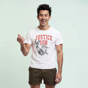 A man wearing a white t-shirt with the text 