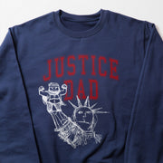 A navy blue sweatshirt with a graphic design featuring a drawing of a person and a statue of the Statue of Liberty.