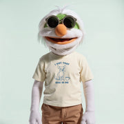 A white and green plush toy with sunglasses and a t-shirt that says 