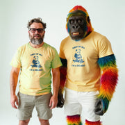 Two men wearing yellow t-shirts with a panda graphic and the text 