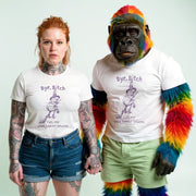 A woman with red hair wearing a white t-shirt with a monkey graphic and the text 