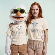 A person wearing a white t-shirt with a graphic of a dog and the text 