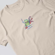 A t-shirt with a graphic design featuring a frog wearing a cape and holding a sword.