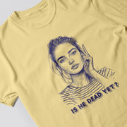 A yellow t-shirt with a drawing of a woman's face and the text 