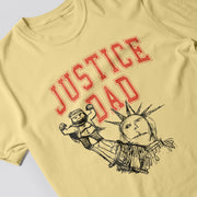 A yellow t-shirt with a graphic design featuring a cartoon character and the text 