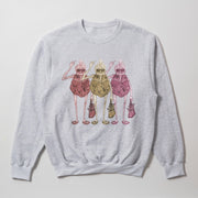A gray sweatshirt with a graphic design featuring three stylized human figures in a line, each holding a bag and wearing sunglasses.