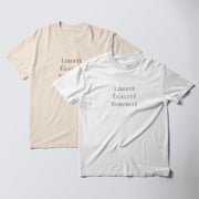 two t-shirts, one white and one beige, both with the same text printed on them.