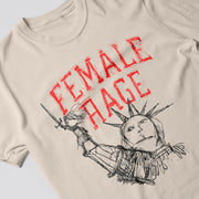 a t-shirt with a graphic design depicting a stylized figure, possibly a person or a character, with a sword in their hand. The text on the t-shirt reads 