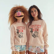 Two women wearing matching pink sweatshirts with the text 