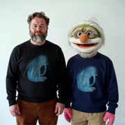 Two men wearing matching black and blue sweatshirts with a blue elephant graphic, posing together against a white background.